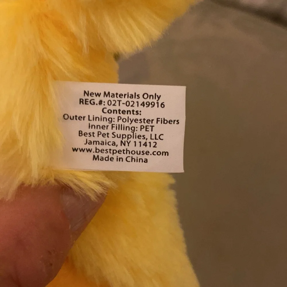 Yellow crinkle duck dog toy FREE with any purchase in closet